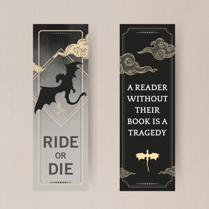 May include: Two black and gold bookmark designs. The first bookmark features a black silhouette of a dragon with clouds and the text "Ride or Die". The second bookmark features a gold silhouette of a dragon with clouds and the text "A reader without their book is a tragedy."