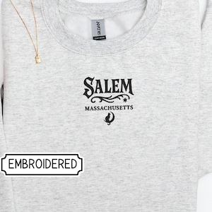 Salem Massachusetts Embroidered Sweatshirt – Gothic Halloween Crewneck with Cat & Stars, Witchy Fall Sweater, Spooky Autumn Gift