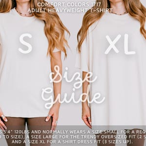 May include: Two women wearing cream-colored Comfort Colors 1717 adult heavyweight t-shirts. The left shirt is size S, the right is XL. Text on the image reads "Size Guide". The model is 5'4" and 120lbs.