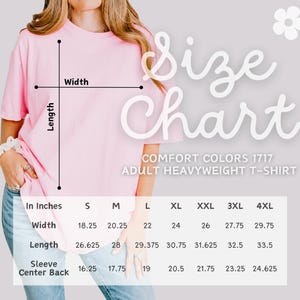May include: A light pink Comfort Colors 1717 adult heavyweight t-shirt with a size chart. The chart shows measurements in inches for width, length, and sleeve center back for sizes S to 4XL. The words "Size Chart" are in a script font.