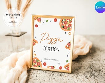 May include: A gold-framed sign with a white background and the text "Pizza Station" in black. The sign is decorated with illustrations of pizza slices, tomatoes, and blueberries.