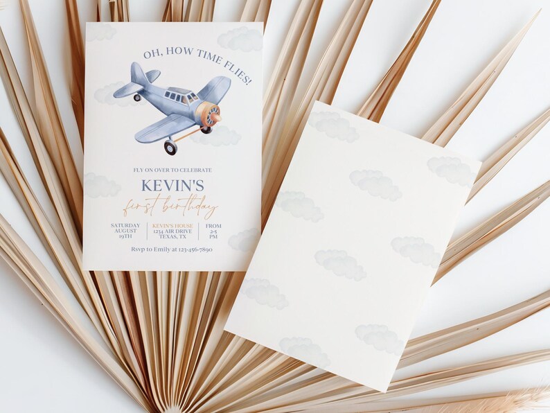 May include: A blue and white airplane with clouds in the background. The text on the invitation reads "Oh, how time flies!" It's on over to celebrate Kevin's first birthday. Saturday, August 19th, from 2-4 PM. 123 Air Drive, Yuma, TX. RSVP to Emily at 123-456-7890.