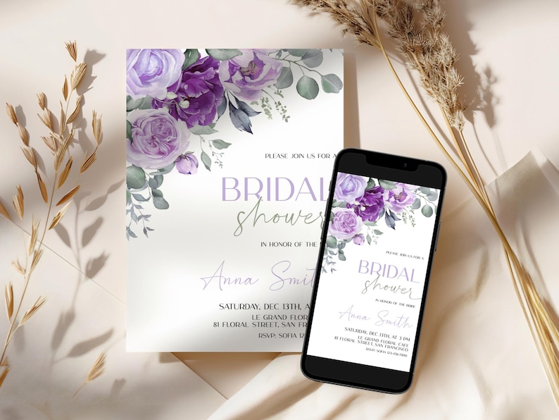 May include: Purple floral bridal shower invitation with a watercolour design. The invitation includes the text "Please join us for a bridal shower in honour of Anna Smith" and the date and time of the event.