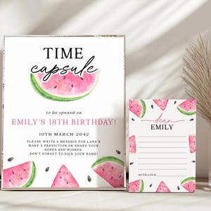 May include: Watermelon themed time capsule sign with instructions to write a message for someone's 18th birthday. The sign is to be opened on March 10th, 2042. A separate card with watermelon graphics says "Dear Emily" and has lines for writing a message.