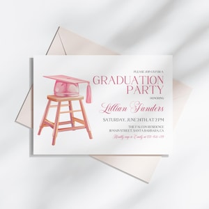 May include: Pink graduation party invitation with a pink graduation cap on a wooden stool. The invitation reads "Please join us for a Graduation Party honoring Lillian Sanders, Saturday, June 24th at 2 PM, The Falcon Residence, 8 Main Street, Santa Barbara, CA.  RSVP to Emily at 123-456-7890."