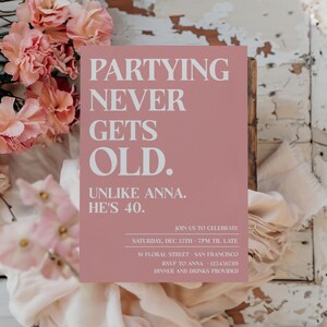 May include: A pink invitation card with white text that reads "Partying never gets old. Unlike Anna. He's 40." The card also includes details for a party, including the date, time, location, and RSVP information.