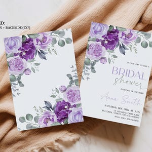 May include: Purple floral bridal shower invitation with the text "Please join us for a bridal shower in honour of the bride Anna Smith" and details for the event.