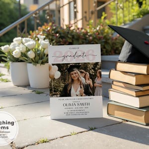 A side-by-side display of a modern photo graduation invitation and mobile evite featuring a pink background, central portrait photo, minimalist white and gold lettering reading Class of 2026 and graduate name, clean layout on matte cardstock and smartphone screen