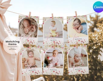 May include: A series of baby milestone cards, each clipped to a string with wooden clothespins. Each card features a baby photo and the month. Floral design with the words "Newborn", "One Month", "Two Months", "Three Months", "Four Months", and "Five Months".