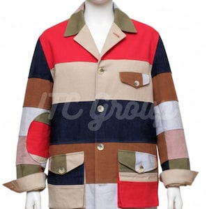 May include: A multi-coloured patchwork jacket featuring red, beige, navy, and brown panels. The jacket has a collared neckline, button fastenings, and two front pockets. The sleeves are cuffed at the wrists.