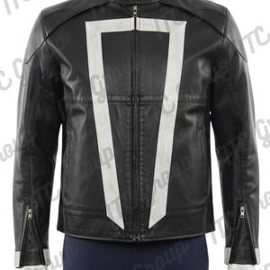 May include: A white ceramic mug with a black handle and the text "But First, Coffee" in a black, bold font. The mug is sitting on a white surface. The mug is approximately 4 inches tall.