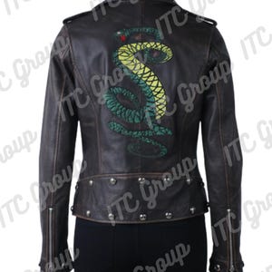 May include: A rustic wooden sign with the text "Welcome to our home" in white lettering. The sign features a distressed finish and a simple, inviting design, perfect for entryway decor.