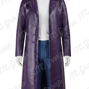 May include: A long, purple, textured coat with a button closure. The coat has a notched collar and long sleeves. The coat is worn over a white shirt and blue trousers. The coat appears to be made of a faux leather material.