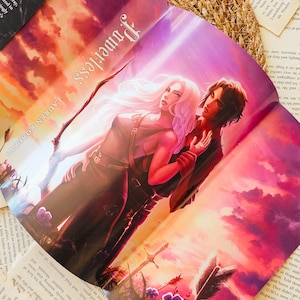 May include: A fantasy novel cover featuring a woman with long blonde hair and a man with dark hair. They are standing in a field with a sunset in the background. The title of the book is "Powerless" and the author is Lauren Roberts.