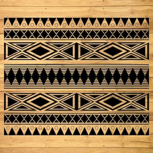 May include: Black and white geometric pattern with repeating shapes of triangles, diamonds, and circles. The pattern is on a wood background.