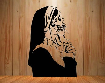 May include: Black and white silhouette of a nun with a skull face, praying with hands clasped together. The image is set against a woodgrain background.