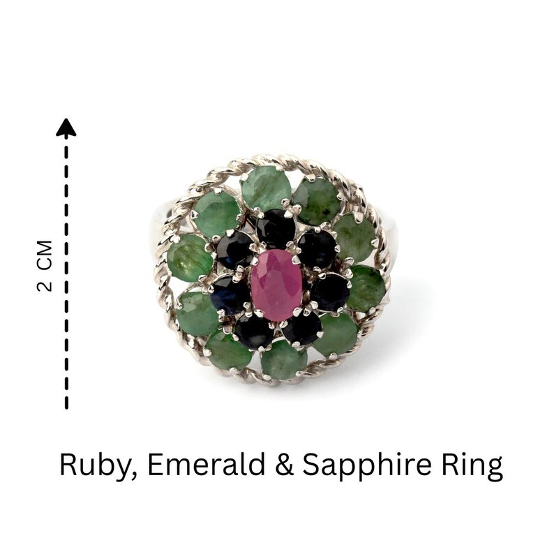 Birthstone ring featuring ruby ring, emerald ring and sapphire ring style