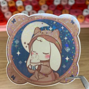 Pegatina de conejo chibi con purpurina holográfica kawaii BunBun "Dulce noche de invierno"