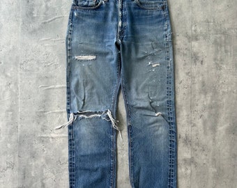 Vintage 60s Levi’s 502 Big E Redlines Jeans (30) Medium Wash distressed repaired selvedge denim made in USA single stitch