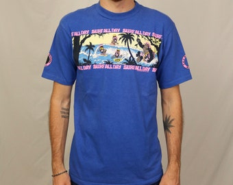 Vintage 80s T&C Surf Designs Hawaii T Shirt (M) blue wrap around graphic tee “surf all day” town and country made in USA