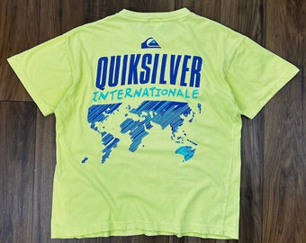 Vintage 90s Quiksilver Internationale surf T Shirt (M) green graphic tee