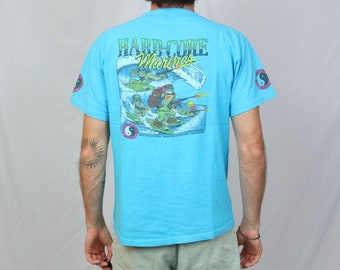 Vintage 90s T&C Surf designs Hawaii t shirt (Boys XL) light blue hard-core marines thrilla gorilla graphic tee made in USA