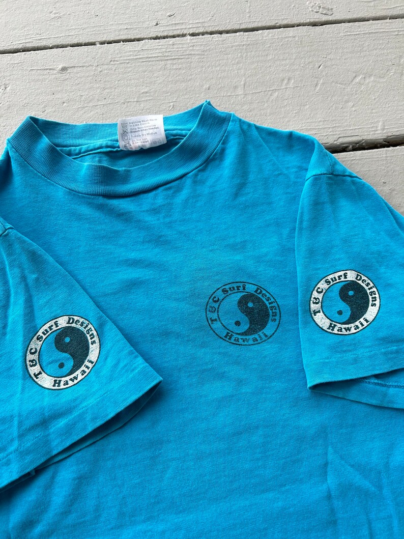 Vintage 80s T&C Surf designs Hawaii t shirt M Hanes Light blue some guys have all the luck thrilla gorilla graphic tee made in USA image 4