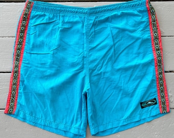 Vintage 90s Quiksilver Surf Boardshorts (waist 34-36) light blue drawstring adjustable nylon made in USA