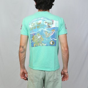 Vintage 80s T&C Surf designs Hawaii t shirt S Light blue green get your head wet thrilla gorilla graphic tee made in USA image 1