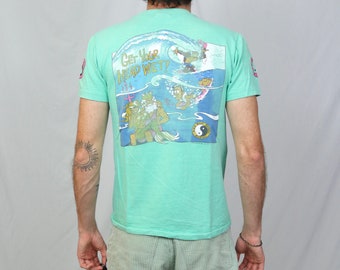 Vintage 80s T&C Surf designs Hawaii t shirt (S) Light blue green get your head wet thrilla gorilla graphic tee made in USA