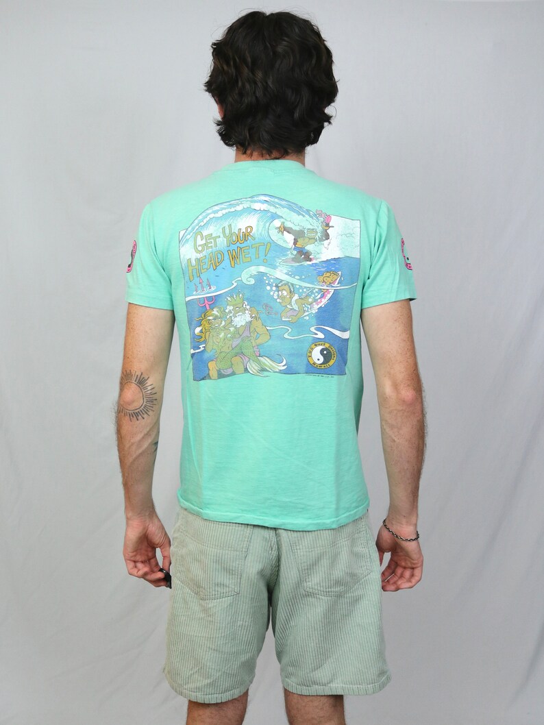 Vintage 80s T&C Surf designs Hawaii t shirt S Light blue green get your head wet thrilla gorilla graphic tee made in USA image 1