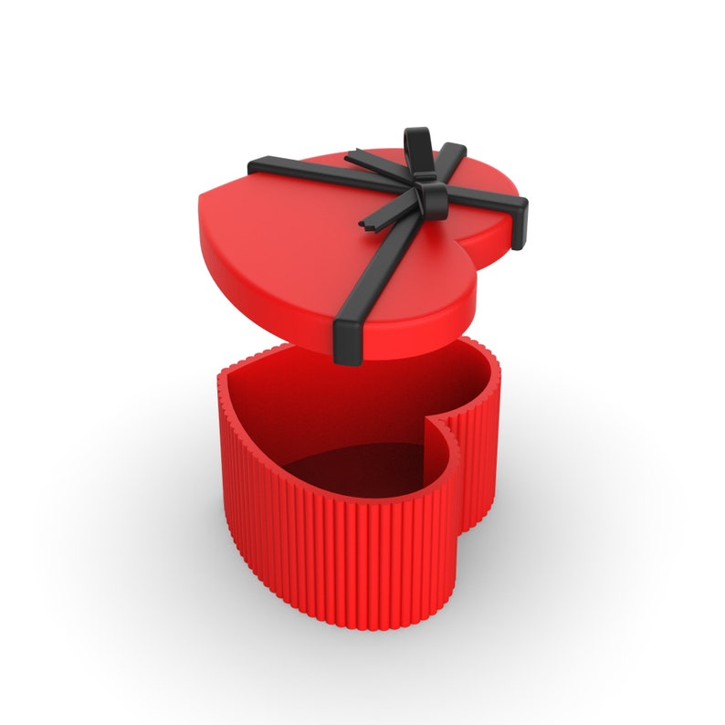 May include: A red heart-shaped gift box with a black ribbon. The box is open and empty.