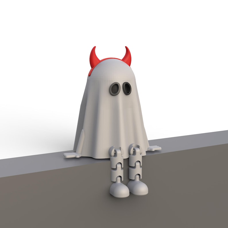 May include: A white ghost figure with black oval eyes and red devil horns. The ghost is sitting with its legs dangling. The figure is a Halloween or spooky-themed decoration.