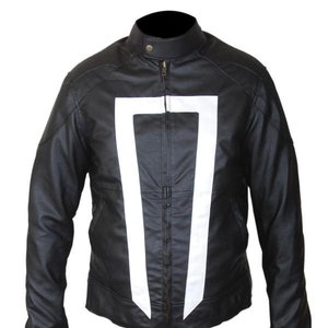 May include: Black leather jacket with a white graphic design on the front. The jacket has a stand-up collar, a zipper closure, and white trim on the cuffs. A stylish outerwear piece.