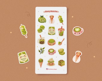 May include: A sticker sheet featuring various matcha-themed illustrations. Designs include matcha lattes, ice cream, macarons, and a whisk. The text "Minty Matcha" is at the top. The stickers are in shades of green, pink, and brown.
