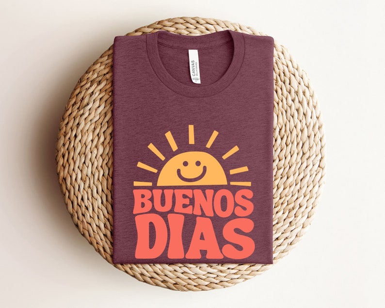 a t - shirt that says buenos dias on it