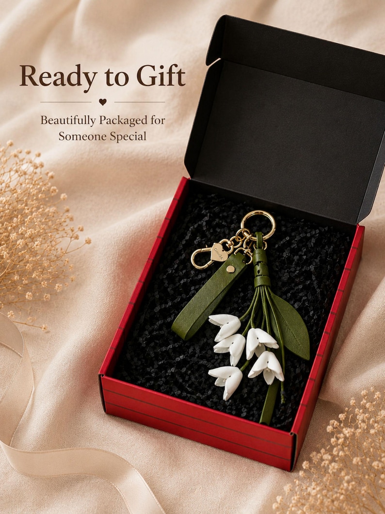 White floral bag charm with leather flowers and gold hardware, elegant purse charm accessory for women, luxury handbag charm with tassel, aesthetic white keychain for tote bag, trendy flower purse accessory, feminine handbag decoration, modern leather floral keychain, gift for her, cute white purse charm, boutique style bag accessory, minimal elegant keychain for handbags, stylish floral charm for purse, luxury fashion bag accessory
