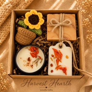 Fall gift box for women, handmade pumpkin soy candle, ceramic mug, artisan soap, decorative glass match bottle, plush teddy bear and cozy autumn socks beautifully arranged in boutique gift packaging. Cozy gift basket and autumn care package perfect as a blanket gift, hygge self care gift, comfort gift, thinking of you gift, appreciation gift, housewarming gift, Thanksgiving hostess gift, birthday gift, get well soon gift and seasonal gift for mom, grandma, sister, friend or coworker.