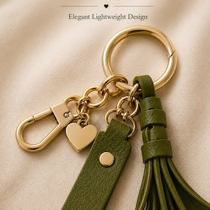 White floral bag charm with leather flowers and gold hardware, elegant purse charm accessory for women, luxury handbag charm with tassel, aesthetic white keychain for tote bag, trendy flower purse accessory, feminine handbag decoration, modern leather floral keychain, gift for her, cute white purse charm, boutique style bag accessory, minimal elegant keychain for handbags, stylish floral charm for purse, luxury fashion bag accessory