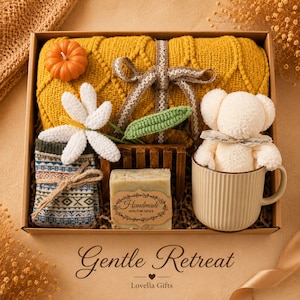 Fall gift box for women, handmade pumpkin soy candle, ceramic mug, artisan soap, decorative glass match bottle, plush teddy bear and cozy autumn socks beautifully arranged in boutique gift packaging. Cozy gift basket and autumn care package perfect as a blanket gift, hygge self care gift, comfort gift, thinking of you gift, appreciation gift, housewarming gift, Thanksgiving hostess gift, birthday gift, get well soon gift and seasonal gift for mom, grandma, sister, friend or coworker.