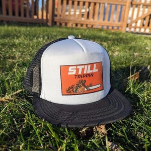 Still Trippin Trucker Hat (DISCOUNTED due to slight heat transfer mark defect)