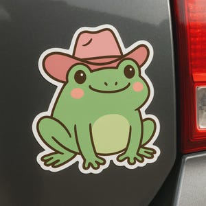 Divertente adesivo a forma di rana con cappello da cowboy rosa per laptop, auto e camper. Regalo per gli amanti degli animali e dell'umorismo un po' eccentrico.