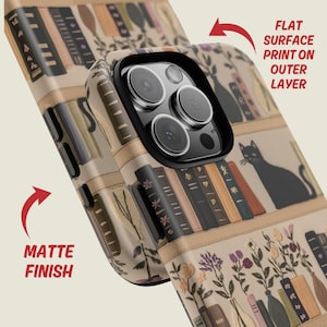 Embrace books and nature with our Bookish Boho Floral Phone Case.  Designed with book lovers in mind, this faux embroidery cat on bookshelf phone case features a flat surface print of shelved books, a cat and flowers on a vintage look background