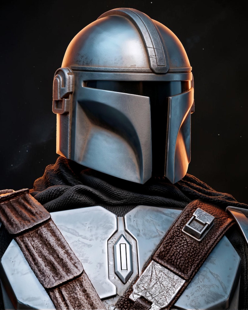 May include: Close-up of a Mandalorian helmet and armor. The helmet is silver with a dark visor and a distinctive T-shaped opening. The armor features a silver chest plate and brown leather straps. A black scarf is visible around the neck.