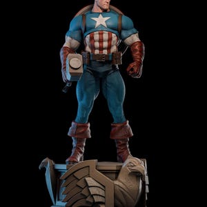 May include: A detailed statue of Captain America in a heroic pose, holding a hammer. The figure wears a blue and white costume with a star emblem and stands on a decorative base with an eagle design. The statue has a muscular build and is set against a black background.