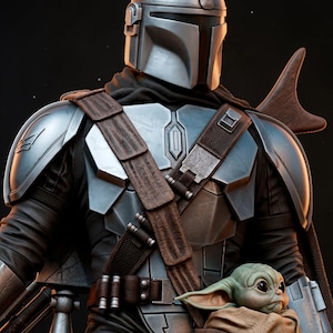 May include: A detailed image of a Mandalorian character in silver armor, with a helmet and brown leather straps. The character is holding a small, green-skinned creature with large ears, wrapped in a brown cloth. The background is dark.