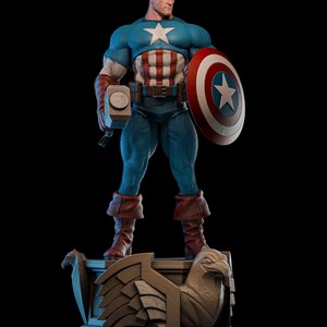May include: A detailed figurine of Captain America, standing on a decorative base. He wears a blue and white costume, holding a hammer and shield. The shield features a white star on a red and white background. The base has an eagle design.
