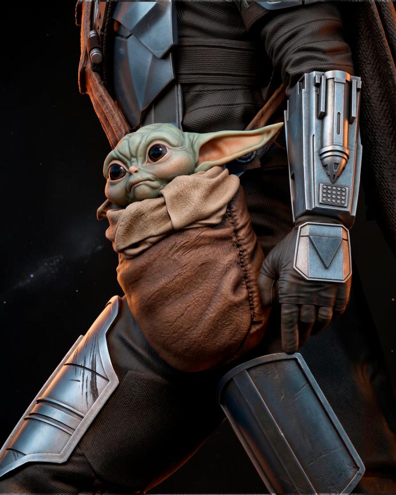 May include: A detailed image of a green-skinned, large-eyed creature nestled in a brown pouch. The creature is held by a person wearing dark armor with silver accents. The scene is set against a dark background, highlighting the details of the character and armor.