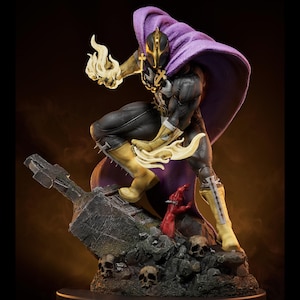 May include: A detailed figurine of a costumed character in a dynamic pose. The figure wears a black and gold suit, a purple hooded cape, and yellow boots. The character holds a flaming object in one hand and stands on a base with skulls and a broken structure.