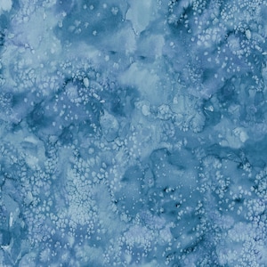 May include: A seamless digital pattern featuring a watercolor wash in various shades of blue. The design displays a textured, mottled effect with lighter white and pale blue speckles layered over deeper navy and indigo pigment concentrations.